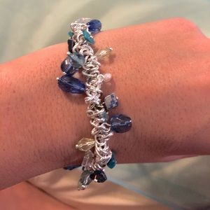 Silver bracelet with blue and green beads
